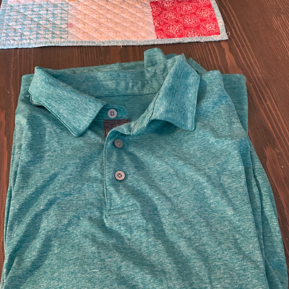 Men’s heathered teal PGA brand golf shirt
